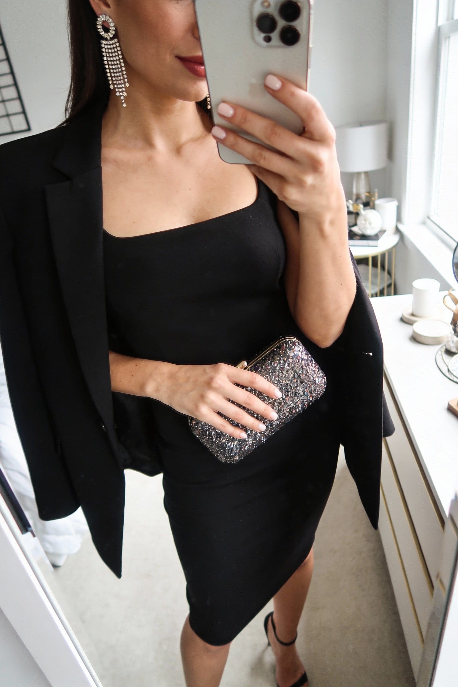 Little black dress with sequin clutch